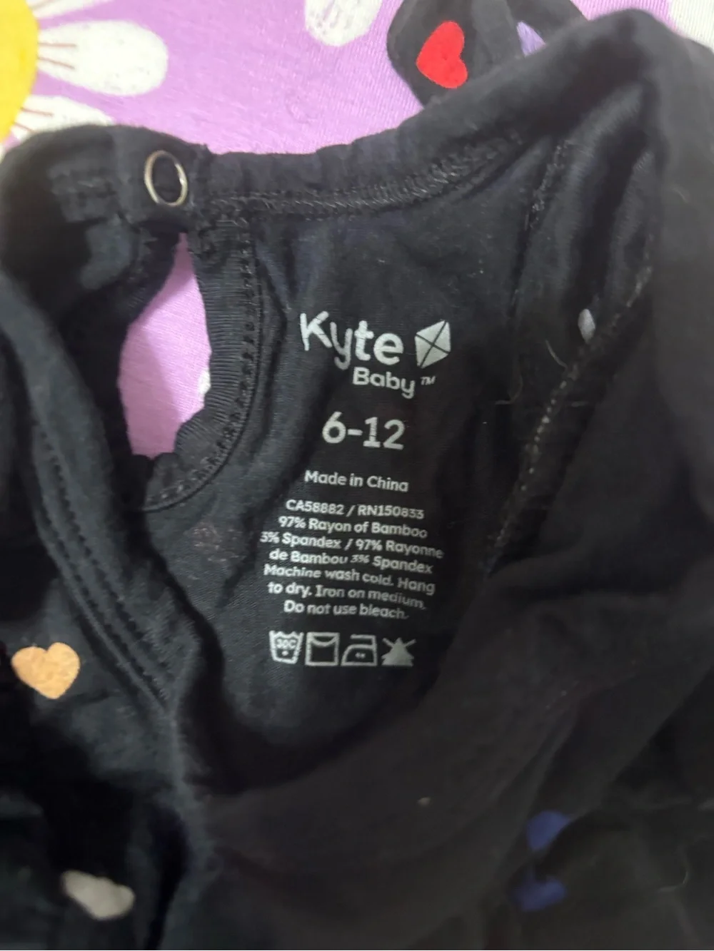 Kyte BABY Black One-Piece with Multicolor Heart Print
